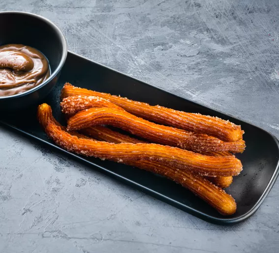 Churros with boiled condensed milk